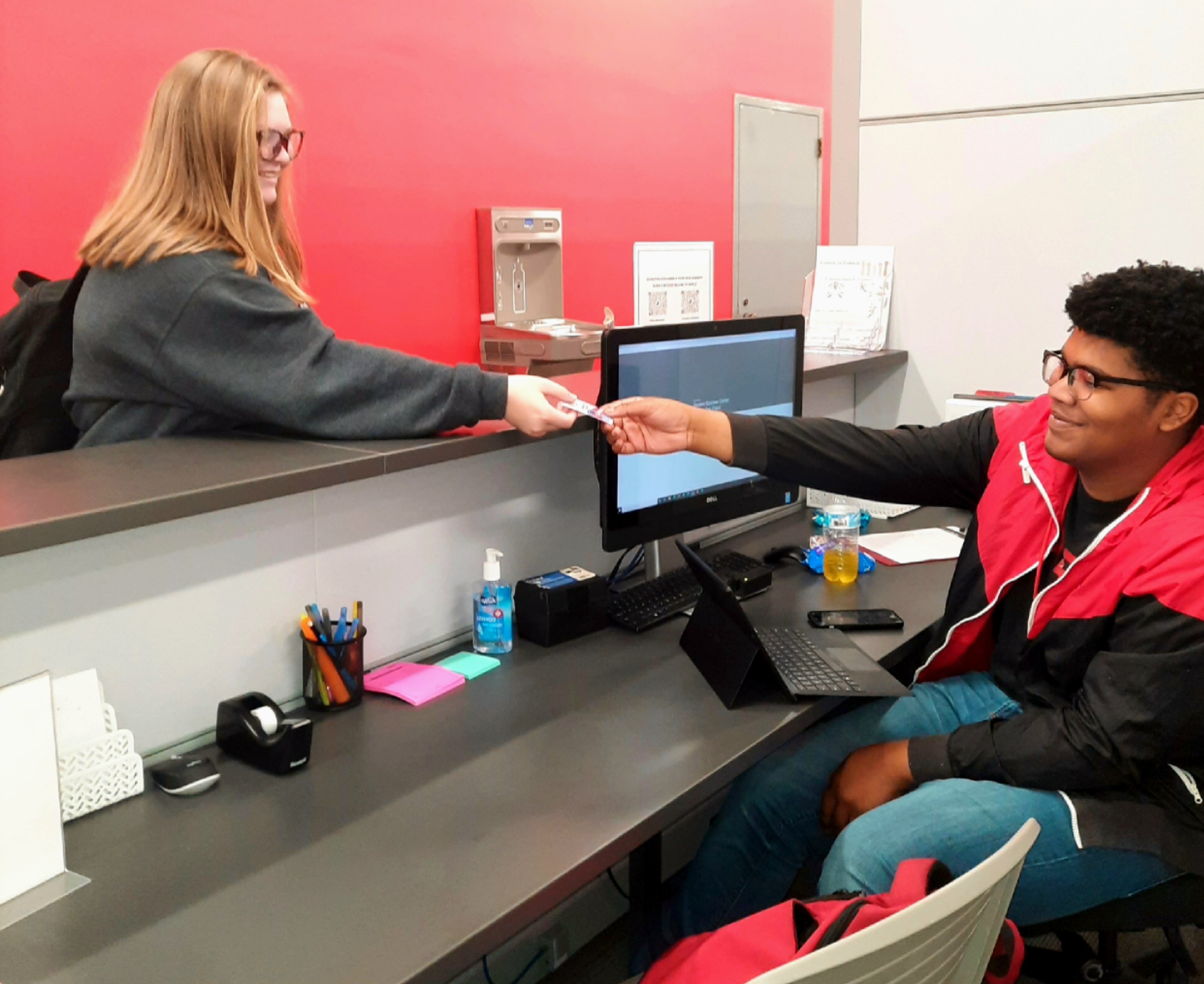 Photo of Student Checking in at a Kiosk